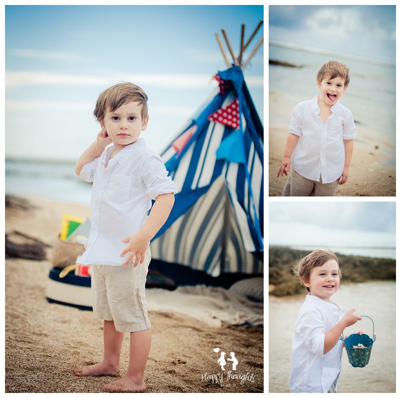 boy having fun at the beach with a teepee