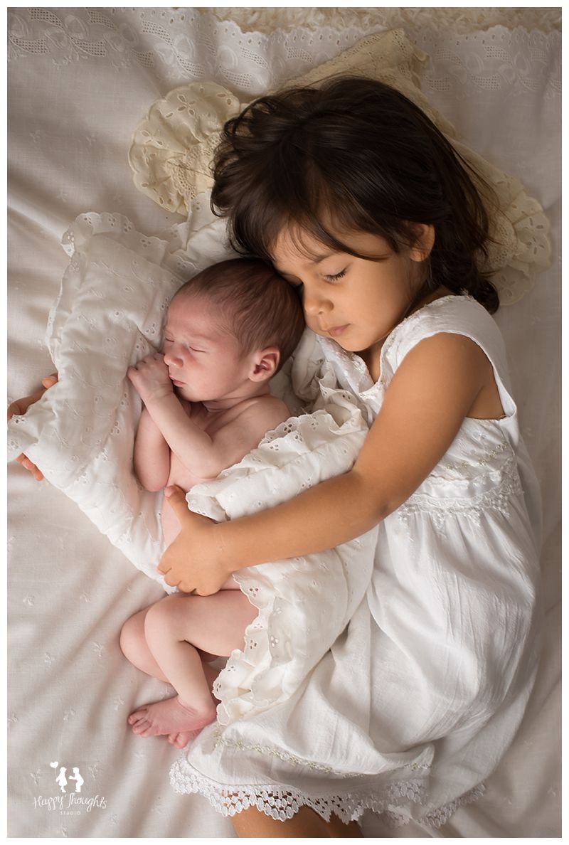 Newborn baby boy with sister photography