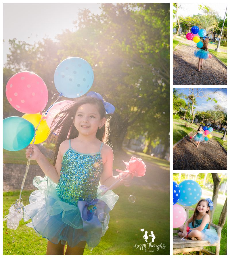 Girl with balloons on a tutu dress