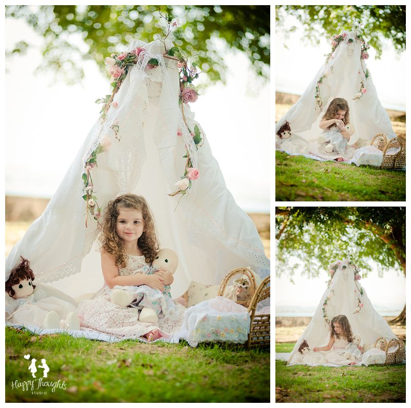 Girl playing with dolls in outdoors tent Children Photography
